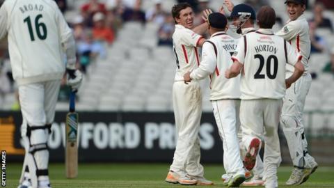 Lancashire celebrate the wicket of Stuart Broad