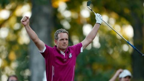 Europe's Luke Donald celebrates on the 17th tee