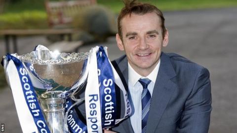 St Mirren manager Danny Lennon poses with the Scottish Communities League Cup