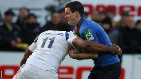 Jonathan Sexton is tackled by Napolioni Nalaga