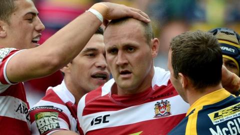 Gareth Hock celebrates after scoring against Leeds Rhinos