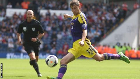 Ben Davies about to shoot for goal for Swansea against West Brom
