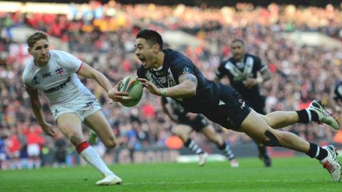 New Zealand's Shaun Johnson scores against England