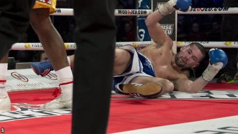 Tony Bellew is knocked to the canvas by Adonis Stevenson