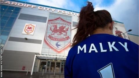 Cardiff supporter outside the Cardiff City Stadium