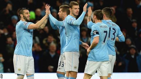 Manchester City players celebrate