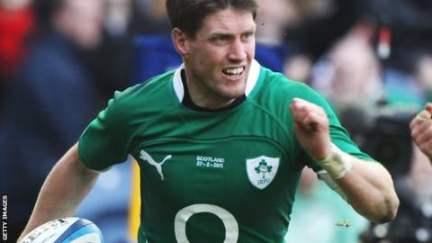 Ronan O'Gara surges away to score a try during the 2011 Six Nations