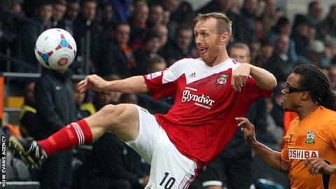 Brett Ormerod of Wrexham takes on Barnet's Edgar Davids