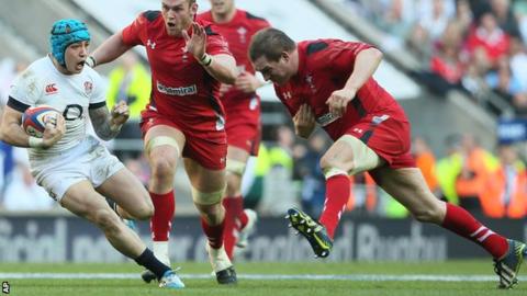 England wing Jack Nowell tries to avoid charging Wales prop Gethin Jenkins