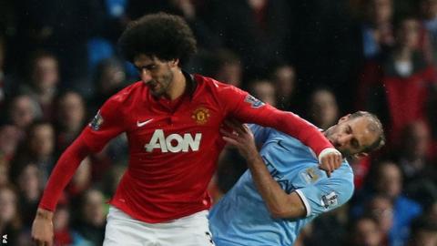 Marouane Fellaini (left) and Pablo Zabaleta