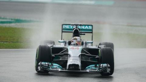 Lewis Hamilton masters the wet conditions to take pole in Malaysia