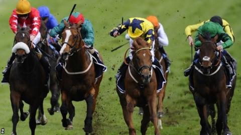 Our Channel, in the blue and yellow silks, wins the Derby Trial at Epsom