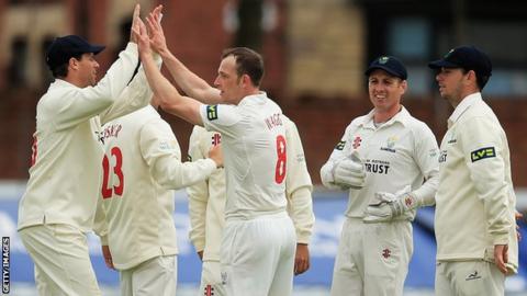 Graham Wagg of Glamorgan is congratulated on the wicket of Ned Eckersley of Leicestershire, after he was bowled during day one of the LV County Championship match