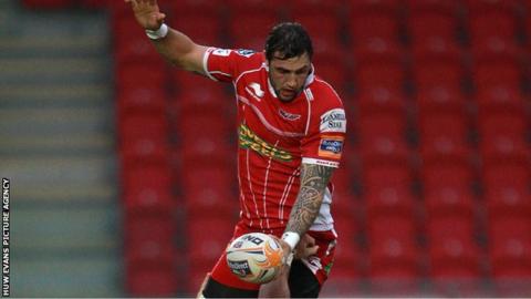 Josh Turnbull wins a lineout for Scarlets