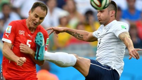Steve von Bergen of Switzerland and Olivier Giroud of France