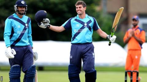 Calum MacLeod celebrates after securing his century in Scotland's triumph