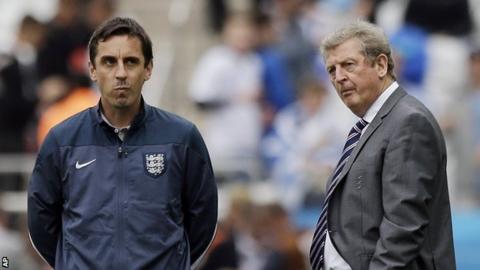 England boss Roy Hodgson (right) and coach Gary Neville