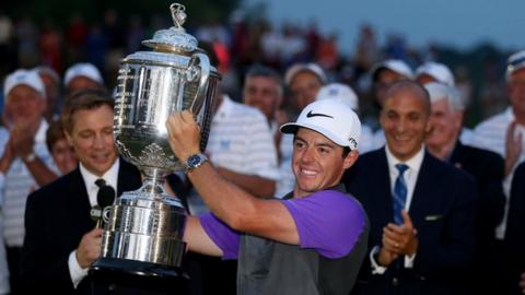 Rory McIlroy lifts the PGA Championship trophy
