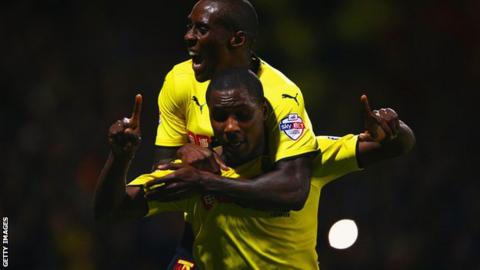 Odion Ighalo celebrates a Watford goal with Lloyd Dyer