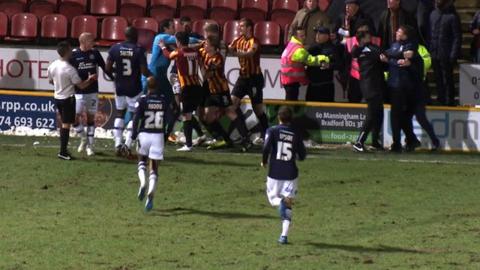 Tempers flare between Bradford City and Millwall players during their FA replay