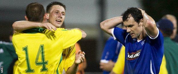 Christian Dailly (right) cannot watch as Kaunas celebrate their shock victory over Rangers