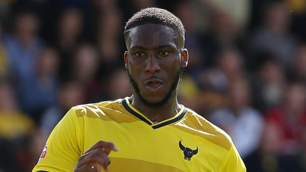 Chey Dunkley: Wigan Athletic sign Oxford United defender on a three-year deal