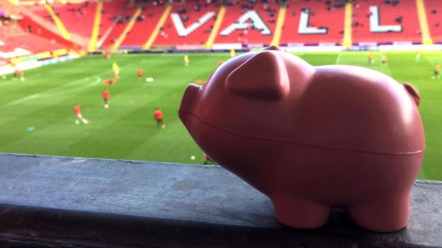 Plastic pigs protest stops play at Charlton v Coventry