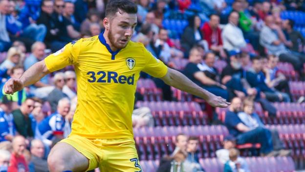 Lewie Coyle: Leeds United full-back signs new deal and joins Fleetwood on loan