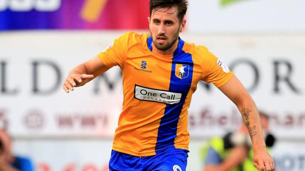 Chris Clements: Grimsby Town sign Mansfield midfielder for undisclosed fee