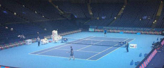 Andy Murray in front of a deserted O2 Arena