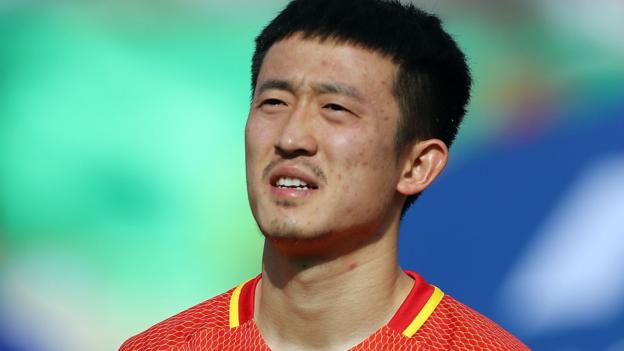 China defender's wife criticises affairs after World Cup qualifying error - BBC Sport