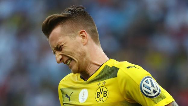 Dortmund winger Reus suffers knee ligament tear