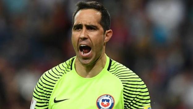 Bravo saves three penalties to send Chile into final