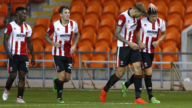 James Jennings: Cheltenham Town defender joins Morecambe on loan
