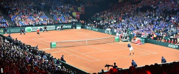 Kyle Edmund plays David Goffin in the Davis Cup final at the Flanders Expo