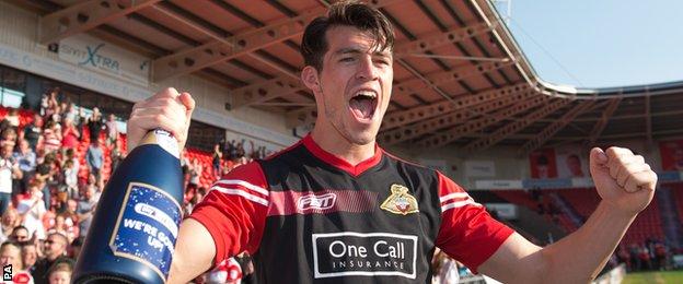 Doncaster's John Marquis celebrates promotion