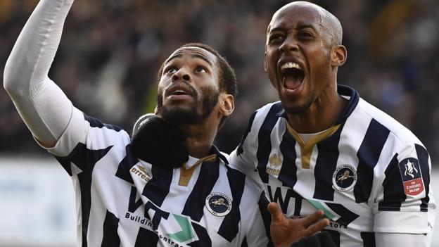 Ten-man Millwall knock out Leicester in last minute