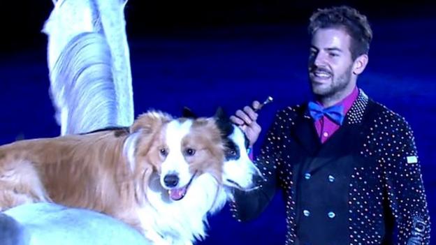 Watch: Two dogs & a man ride a horse at Olympia