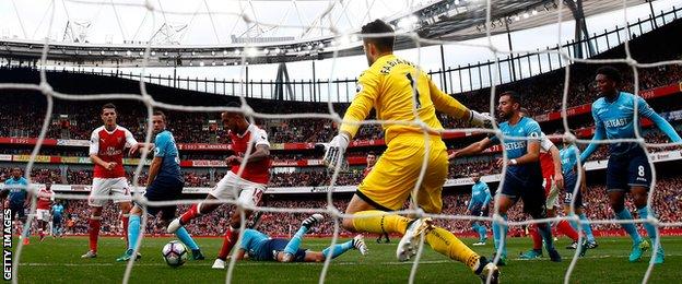 Walcott scores