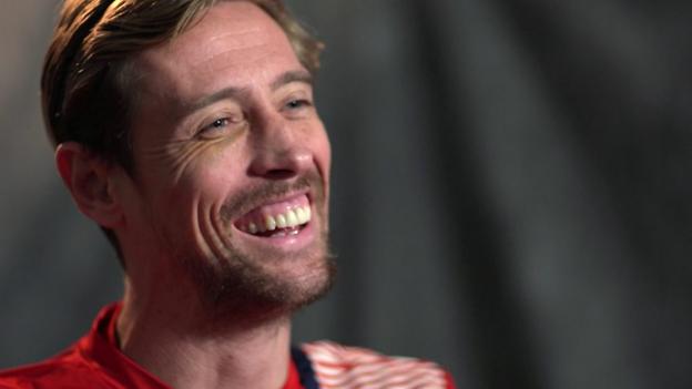 Will Stoke's Peter Crouch do 'the robot' for his 100th goal?