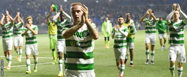 Leigh Griffiths and his team-mates acknowledge the travelling fans in Astana