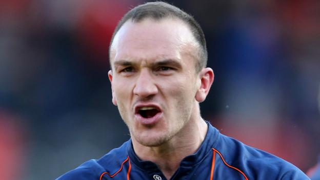 Tom Aldred: Bury sign Blackpool defender on a two-year deal