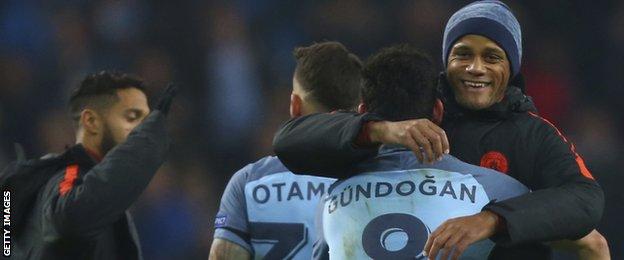 Kompany hugs Gundogan