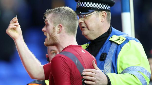 Brunt 'disgusted' by coin-throwing fan