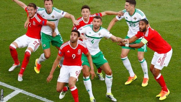 Wales defend a free-kick against Northern Ireland