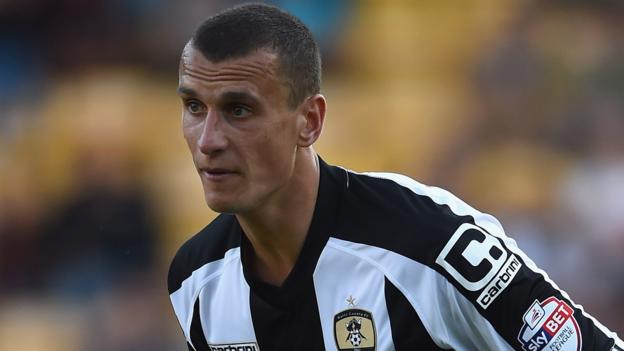 Haydn Hollis: Central defender signs new Notts County contract