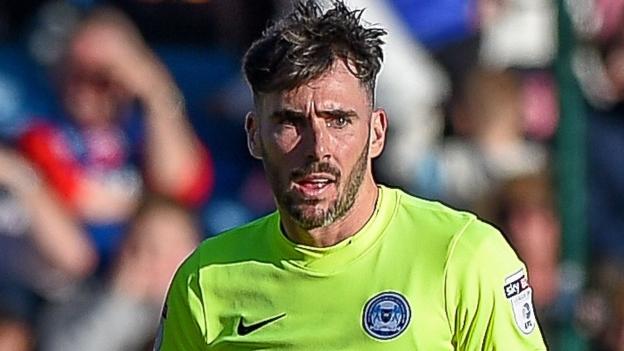 Hearts secure Michael Smith from Peterborough United for nominal fee