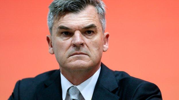 IAAF's Davies steps aside in probe