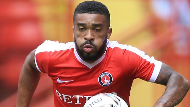 Tareiq Holmes-Dennis: Charlton Athletic left-back joins Huddersfield Town