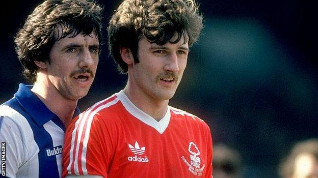 Mark Lawrenson of Brighton and Nottingham Forest's Garry Birtles pictured at the Goldstone Ground in 1980